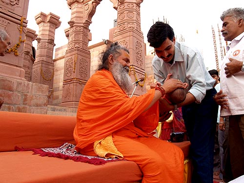 Swamiji giving blessing to the smallest of devotees